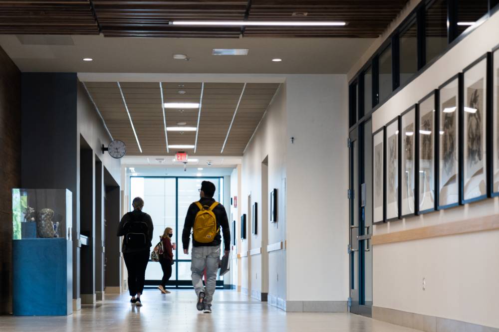 Students walking through the hallway